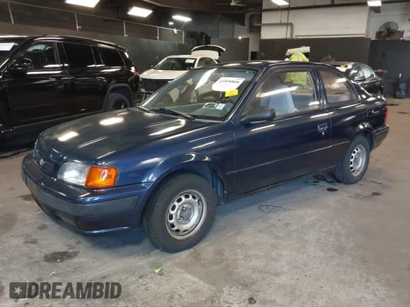✅ 1996 Toyota Tercel DX • VIN: JT2AC52L9T0139217 • Lot: 41898808. Wystawiony na IAAI z przebiegiem 86 500 mil. Bezpłatny archiwum sprzedaży aukcyjnych z USA i szczegółowy raport historii pojazdu na DreamBid. Zdjęcie 17.