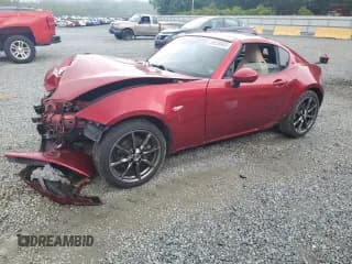 ✅ 2019 Mazda MX-5 Miata Grand Touring • VIN: JM1NDAM79K0311307 • Lot: 56828685. Listed on Copart with 31,801 mi. Free auction sales archive from the USA and detailed vehicle history report at DreamBid. Image 1.