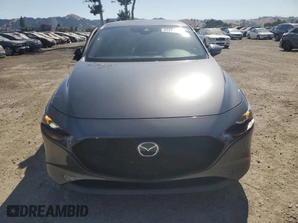 ✅ 2019 Mazda 3 • VIN: JM1BPBJMXK1123383 • Лот: 62372965. Опубликован ранее на Copart с пробегом 57 103 миль. Бесплатный доступ к архиву аукционных продаж из США и подробный отчёт об истории автомобиля на DreamBid. Изображение 5.