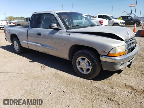 1999 Dodge Dakota SLT z VIN 1B7GL22X8XS145362, wystawiony jako Copart lot #73281704 z przebiegiem Nie podano mil oraz Szkoda całkowita • Salvage title. Historia ofert i sprzedaży dostępna na DreamBid. Obrazek 4.