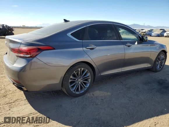 2015 Hyundai Genesis 3.8L z VIN KMHGN4JE4FU096598, wystawiony jako Copart lot #77477754 z przebiegiem 92 316 mil mil oraz Szkoda całkowita • Salvage title. Historia ofert i sprzedaży dostępna na DreamBid. Obrazek 3.