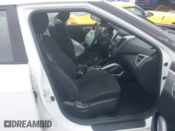 ✅ 2014 Hyundai Veloster • VIN: KMHTC6ADXEU186893 • Lot: 41510743. Wystawiony na IAAI z przebiegiem Nie podano. Bezpłatny archiwum sprzedaży aukcyjnych z USA i szczegółowy raport historii pojazdu na DreamBid. Zdjęcie 5.