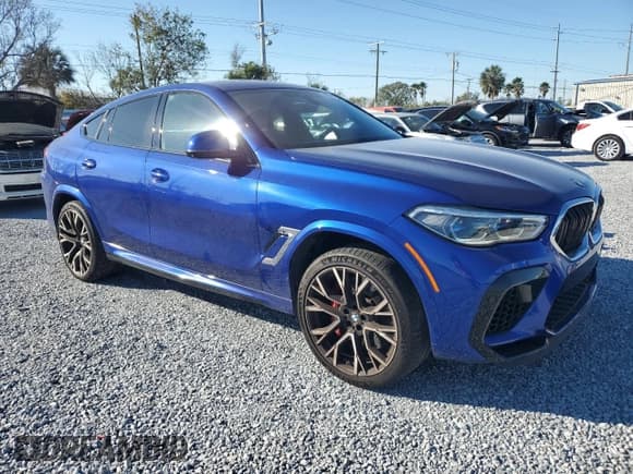 ✅ 2023 BMW X6 M • VIN: 5YMCY0C04P9R20034 • Lot: 87641755. Listed on Copart with 19,141 mi. Free auction sales archive from the USA and detailed vehicle history report at DreamBid. Image 4.