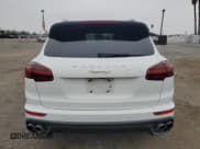 ✅ 2017 Porsche Cayenne S E-Hybrid • VIN: WP1AE2A2XHLA75671 • Lot: 76419144. Listed on Copart with 98,898 mi. Free auction sales archive from the USA and detailed vehicle history report at DreamBid. Image 6.
