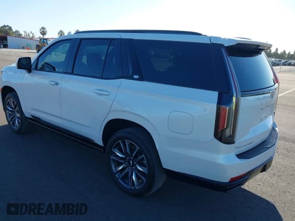✅ 2023 Cadillac Escalade 4WD Sport • VIN: 1GYS4FKL7PR286940 • Лот: 40702874. Опубликован ранее на IAAI с пробегом 7 981 миль. Бесплатный доступ к архиву аукционных продаж из США и подробный отчёт об истории автомобиля на DreamBid. Изображение 3.