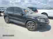 2013 Volkswagen Tiguan SE с VIN WVGAV7AXXDW519677, выставлен на аукционе Copart как лот 72686304 с пробегом Не указан миль и Списание • Salvage title. История ставок и продаж доступна на DreamBid. Изображение 4.