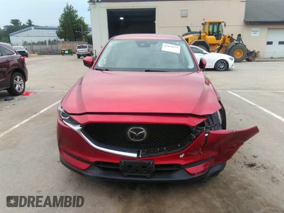 ✅ 2021 Mazda CX-5 Touring • VIN: JM3KFBCMXM1303358 • Lot: 42829675. Wystawiony na IAAI z przebiegiem 53 848 mil. Bezpłatny archiwum sprzedaży aukcyjnych z USA i szczegółowy raport historii pojazdu na DreamBid. Zdjęcie 12.