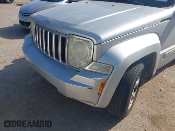 ✅ 2012 Jeep Liberty Limited • VIN: 1C4PJLCK5CW144669 • Lot: 43133890. Listed on IAAI with 157,961 mi. Free auction sales archive from the USA and detailed vehicle history report at DreamBid. Image 6.