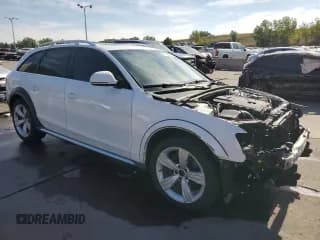 ✅ 2014 Audi allroad A4 Premium • VIN: WA1TFAFLXEA095651 • Lot: 71114674. Listed on Copart with 123,095 mi. Free auction sales archive from the USA and detailed vehicle history report at DreamBid. Image 4.