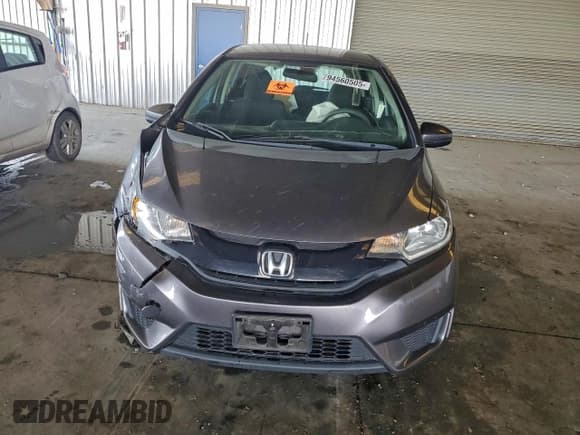 ✅ 2015 Honda Fit LX • VIN: 3HGGK5G53FM707012 • Lot: 94560505. Listed on Copart with Not provided. Free auction sales archive from the USA and detailed vehicle history report at DreamBid. Image 5.