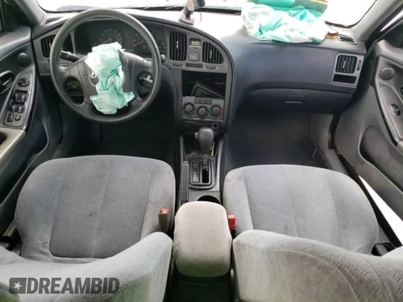 2006 Hyundai Elantra GLS с VIN KMHDN46D16U279492, выставлен на аукционе Copart как лот 58852794 с пробегом 174 976 миль миль и Списание • Salvage title. История ставок и продаж доступна на DreamBid. Изображение 8.