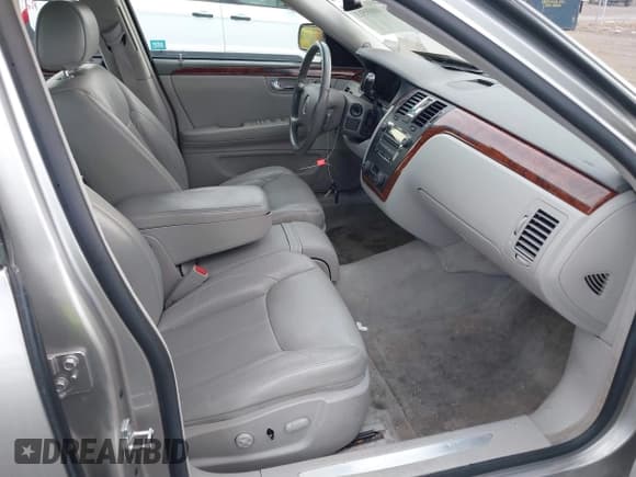 ✅ 2006 Cadillac DTS 1SC • VIN: 1G6KD57Y36U149979 • Lot: 41600417. Listed on IAAI with 106,058 mi. Free auction sales archive from the USA and detailed vehicle history report at DreamBid. Image 5.
