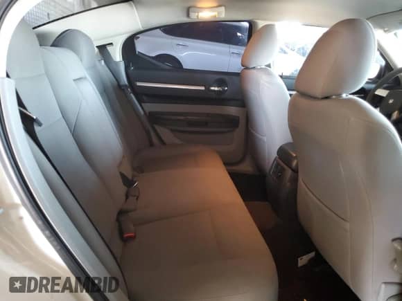 2009 Dodge Charger SXT z VIN 2B3KA33V39H573080, wystawiony jako Copart lot #77794044 z przebiegiem 117 601 mil mil oraz Szkoda całkowita • Salvage title. Historia ofert i sprzedaży dostępna na DreamBid. Obrazek 10.