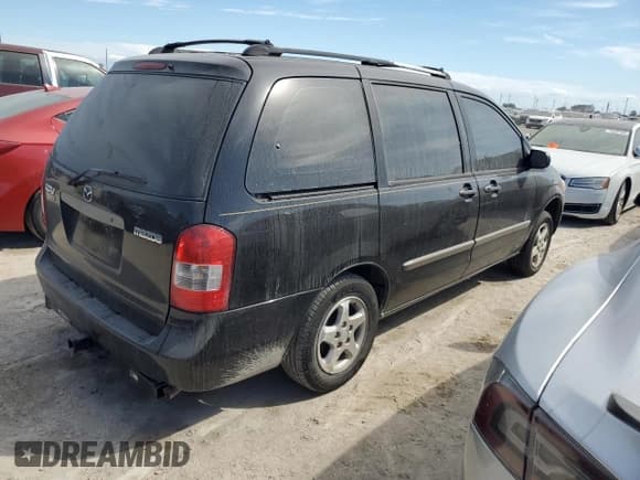 ✅ 2001 Mazda MPV DX • VIN: JM3LW28G310173674 • Lot: 75312034. Listed on Copart with Not provided. Free auction sales archive from the USA and detailed vehicle history report at DreamBid. Image 3.