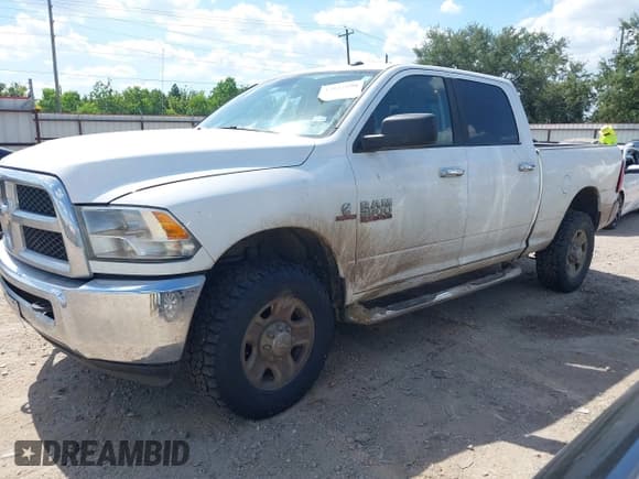 ✅ 2015 Ram 2500 SLT • VIN: 3C6UR5DL9FG638641 • Lot: 42822298. Listed on IAAI with 305,249 mi. Free auction sales archive from the USA and detailed vehicle history report at DreamBid. Image 17.