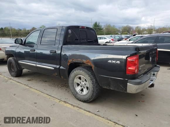 2008 Dodge Dakota Laramie с VIN 1D7HW58N08S633022, выставлен на аукционе Copart как лот 48106124 с пробегом 235 839 миль миль и На запчасти • Non repairable. История ставок и продаж доступна на DreamBid. Изображение 2.