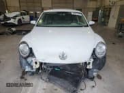 ✅ 2013 Volkswagen Beetle 2.5L • VIN: 3VWJX7AT1DM632703 • Lot: 92857275. Listed on Copart with 144,477 mi. Free auction sales archive from the USA and detailed vehicle history report at DreamBid. Image 5.