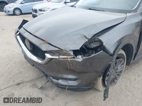 ✅ 2021 Mazda CX-5 Touring • VIN: JM3KFBCM5M0362002 • Lot: 43632624. Wystawiony na IAAI z przebiegiem 76 380 mil. Bezpłatny archiwum sprzedaży aukcyjnych z USA i szczegółowy raport historii pojazdu na DreamBid. Zdjęcie 6.