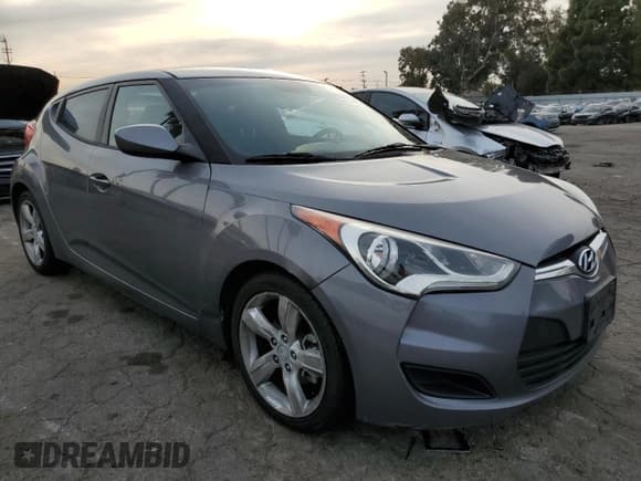 ✅ 2014 Hyundai Veloster • VIN: KMHTC6AD2EU217571 • Lot: 84044224. Listed on Copart with 137,609 mi. Free auction sales archive from the USA and detailed vehicle history report at DreamBid. Image 4.