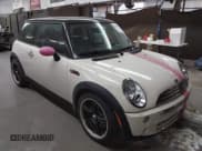 ✅ 2006 MINI Hardtop • VIN: WMWRC33506TK15034 • Lot: 42349957. Listed on IAAI with 153,596 mi. Free auction sales archive from the USA and detailed vehicle history report at DreamBid. Image 1.