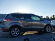 ✅ 2014 Ford Escape Titanium • VIN: 1FMCU0J90EUD17965 • Лот: 43598501. Опубликован ранее на IAAI с пробегом 123 145 миль. Бесплатный доступ к архиву аукционных продаж из США и подробный отчёт об истории автомобиля на DreamBid. Изображение 14.