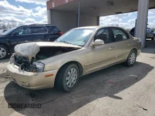 ✅ 2003 Kia Optima LX • VIN: KNAGD126435225214 • Лот: 50825505. Опубликован ранее на Copart с пробегом 64 868 миль. Бесплатный доступ к архиву аукционных продаж из США и подробный отчёт об истории автомобиля на DreamBid. Изображение 1.