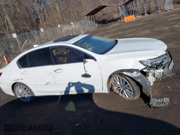 ✅ 2015 Acura RLX Technology • VIN: JH4KC1F59FC001730 • Lot: 41688569. Listed on IAAI with 142,933 mi. Free auction sales archive from the USA and detailed vehicle history report at DreamBid. Image 13.