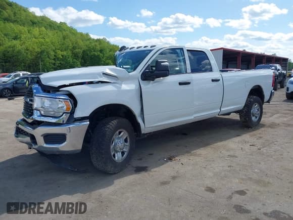 ✅ 2023 Ram 2500 Tradesman • VIN: 3C6UR5HJ9PG564714 • Lot: 42118104. Listed on IAAI with 18,111 mi. Free auction sales archive from the USA and detailed vehicle history report at DreamBid. Image 18.