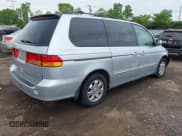 ✅ 2004 Honda Odyssey EX-L • VIN: 5FNRL18764B036904 • Lot: 42212028. Wystawiony na IAAI z przebiegiem 146 875 mil. Bezpłatny archiwum sprzedaży aukcyjnych z USA i szczegółowy raport historii pojazdu na DreamBid. Zdjęcie 4.