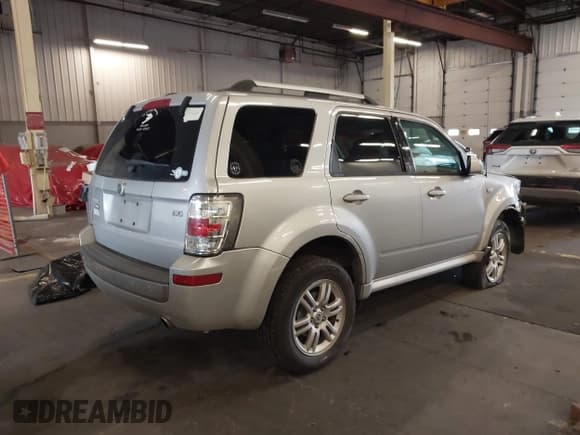 ✅ 2009 Mercury Mariner Premier • VIN: 4M2CU97799KJ18651 • Lot: 43508657. Wystawiony na IAAI z przebiegiem 150 261 mil. Bezpłatny archiwum sprzedaży aukcyjnych z USA i szczegółowy raport historii pojazdu na DreamBid. Zdjęcie 4.