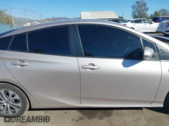 ✅ 2022 Toyota Prius XLE • VIN: JTDKAMFP1N3203339 • Lot: 43495592. Listed on IAAI with 59,866 mi. Free auction sales archive from the USA and detailed vehicle history report at DreamBid. Image 13.