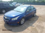 ✅ 2013 Chevrolet Cruze LS • VIN: 1G1PA5SH6D7164208 • Lot: 42897508. Listed on IAAI with 141,375 mi. Free auction sales archive from the USA and detailed vehicle history report at DreamBid. Image 2.