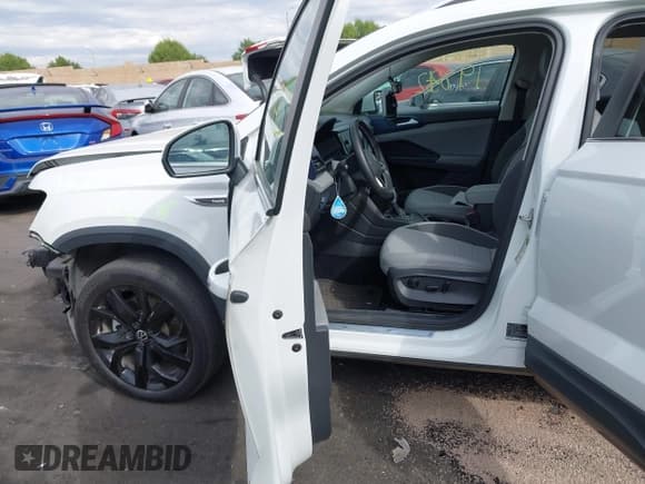 ✅ 2023 Volkswagen Taos SE • VIN: 3VVEX7B22PM327758 • Lot: 43419842. Listed on IAAI with 28,091 mi. Free auction sales archive from the USA and detailed vehicle history report at DreamBid. Image 5.