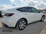 ✅ 2022 Tesla Model Y Long Range • VIN: 7SAYGDEE6NF327170 • Лот: 82334885. Опубликован ранее на Copart с пробегом 76 961 миль. Бесплатный доступ к архиву аукционных продаж из США и подробный отчёт об истории автомобиля на DreamBid. Изображение 3.