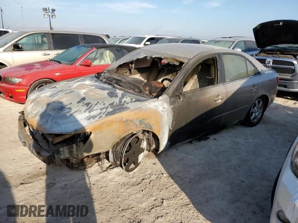 ✅ 2006 Hyundai Sonata GLS • VIN: 5NPEU46C86H166183 • Лот: 75088994. Опубликован ранее на Copart с пробегом Не указан. Бесплатный доступ к архиву аукционных продаж из США и подробный отчёт об истории автомобиля на DreamBid. Изображение 1.