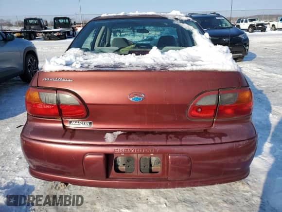 2003 Chevrolet Malibu z VIN 1G1ND52J73M630438, wystawiony jako Copart lot #88669645 z przebiegiem 97 509 mil mil oraz Szkoda całkowita • Salvage title. Historia ofert i sprzedaży dostępna na DreamBid. Obrazek 6.