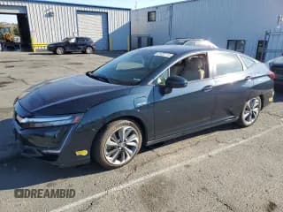 ✅ 2019 Honda Clarity Touring • VIN: JHMZC5F38KC000017 • Lot: 81032715. Wystawiony na Copart z przebiegiem 107 191 mil. Bezpłatny archiwum sprzedaży aukcyjnych z USA i szczegółowy raport historii pojazdu na DreamBid. Zdjęcie 1.