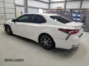 ✅ 2022 Toyota Camry SE • VIN: 4T1T11AK9NU669508 • Lot: 89701515. Wystawiony na Copart z przebiegiem 112 850 mil. Bezpłatny archiwum sprzedaży aukcyjnych z USA i szczegółowy raport historii pojazdu na DreamBid. Zdjęcie 2.