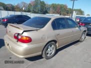 ✅ 2003 Chevrolet Malibu LS • VIN: 1G1NE52J33M615058 • Lot: 43684608. Listed on IAAI with 138,574 mi. Free auction sales archive from the USA and detailed vehicle history report at DreamBid. Image 4.