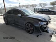 ✅ 2019 Audi RS 3 • VIN: WUABWGFF0KA907343 • Лот: 49181564. Опубликован ранее на Copart с пробегом 57 074 миль. Бесплатный доступ к архиву аукционных продаж из США и подробный отчёт об истории автомобиля на DreamBid. Изображение 4.