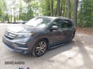 ✅ 2017 Honda Pilot Elite • VIN: 5FNYF6H02HB100235 • Lot: 43026575. Wystawiony na IAAI z przebiegiem 174 362 mil. Bezpłatny archiwum sprzedaży aukcyjnych z USA i szczegółowy raport historii pojazdu na DreamBid. Zdjęcie 2.