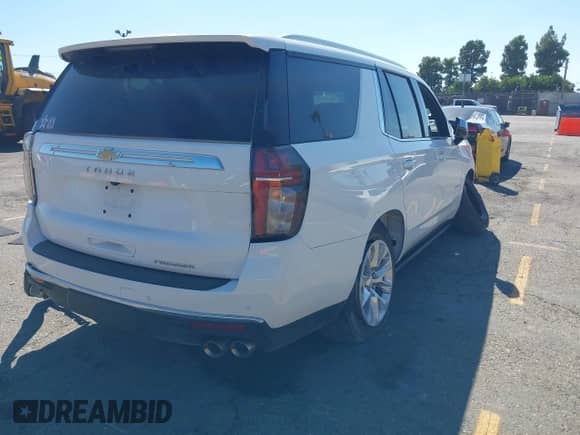 2023 Chevrolet Tahoe Premier z VIN 1GNSKSKD7PR196918, wystawiony jako IAAI lot #43356101 z przebiegiem 13 675 mil mil oraz . Historia ofert i sprzedaży dostępna na DreamBid. Obrazek 4.