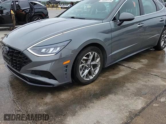 2021 Hyundai Sonata SEL z VIN 5NPEF4JA1MH102810, wystawiony jako Copart lot #70359175 z przebiegiem 49 293 mil mil oraz Czysty tytuł • Clean title. Historia ofert i sprzedaży dostępna na DreamBid. Obrazek 13.