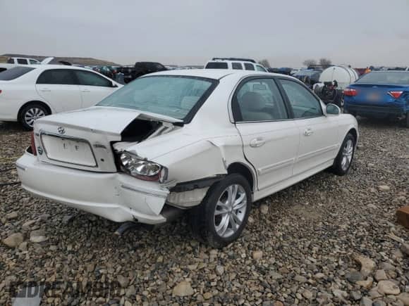 2004 Hyundai Sonata GLS z VIN KMHWF35HX4A994838, wystawiony jako Copart lot #41637995 z przebiegiem 235 568 mil mil oraz Czysty tytuł • Clean title. Historia ofert i sprzedaży dostępna na DreamBid. Obrazek 3.