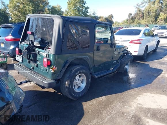 ✅ 2001 Jeep Wrangler Sport • VIN: 1J4FA49SX1P331951 • Лот: 43494613. Опубликован ранее на IAAI с пробегом 86 086 миль. Бесплатный доступ к архиву аукционных продаж из США и подробный отчёт об истории автомобиля на DreamBid. Изображение 4.