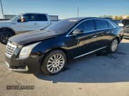✅ 2015 Cadillac XTS Livery • VIN: 2G61U5S36F9197237 • Lot: 92855585. Listed on Copart with 190,450 mi. Free auction sales archive from the USA and detailed vehicle history report at DreamBid. Image 1.