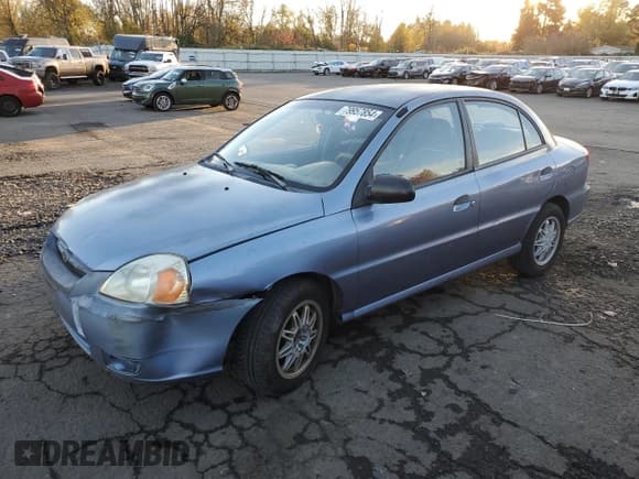 ✅ 2004 Kia Rio • VIN: KNADC125946336107 • Лот: 79957854. Опубликован ранее на Copart с пробегом 201 254 миль. Бесплатный доступ к архиву аукционных продаж из США и подробный отчёт об истории автомобиля на DreamBid. Изображение 1.