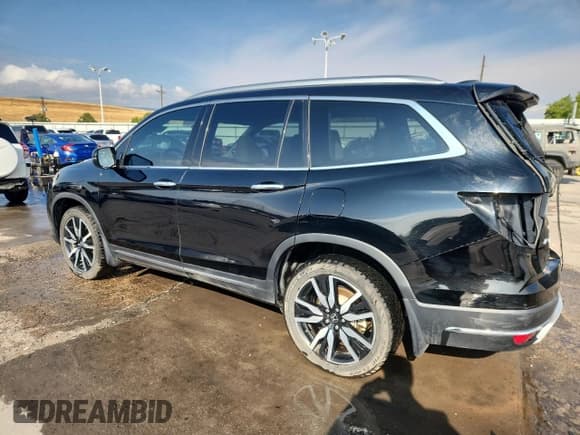 ✅ 2019 Honda Pilot Touring 7-Passenger • VIN: 5FNYF6H69KB092985 • Lot: 69071955. Listed on Copart with 128,915 mi. Free auction sales archive from the USA and detailed vehicle history report at DreamBid. Image 2.