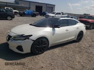 ✅ 2023 Nissan Maxima SR • VIN: 1N4AA6EV3PC508695 • Лот: 61896825. Опубликован ранее на Copart с пробегом 47 034 миль. Бесплатный доступ к архиву аукционных продаж из США и подробный отчёт об истории автомобиля на DreamBid. Изображение 1.