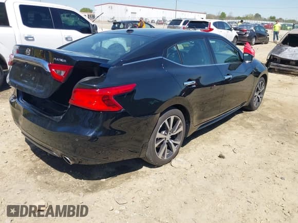 ✅ 2016 Nissan Maxima Platinum • VIN: 1N4AA6AP7GC396362 • Lot: 41871744. Listed on IAAI with 71,126 mi. Free auction sales archive from the USA and detailed vehicle history report at DreamBid. Image 4.